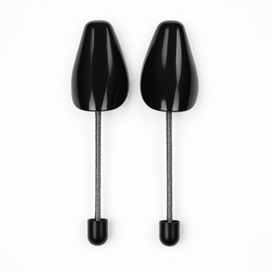 a pair of black shoes with metal tips