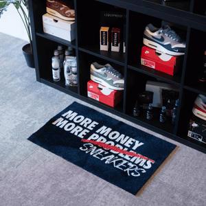 a shoe rack with shoes and a rug