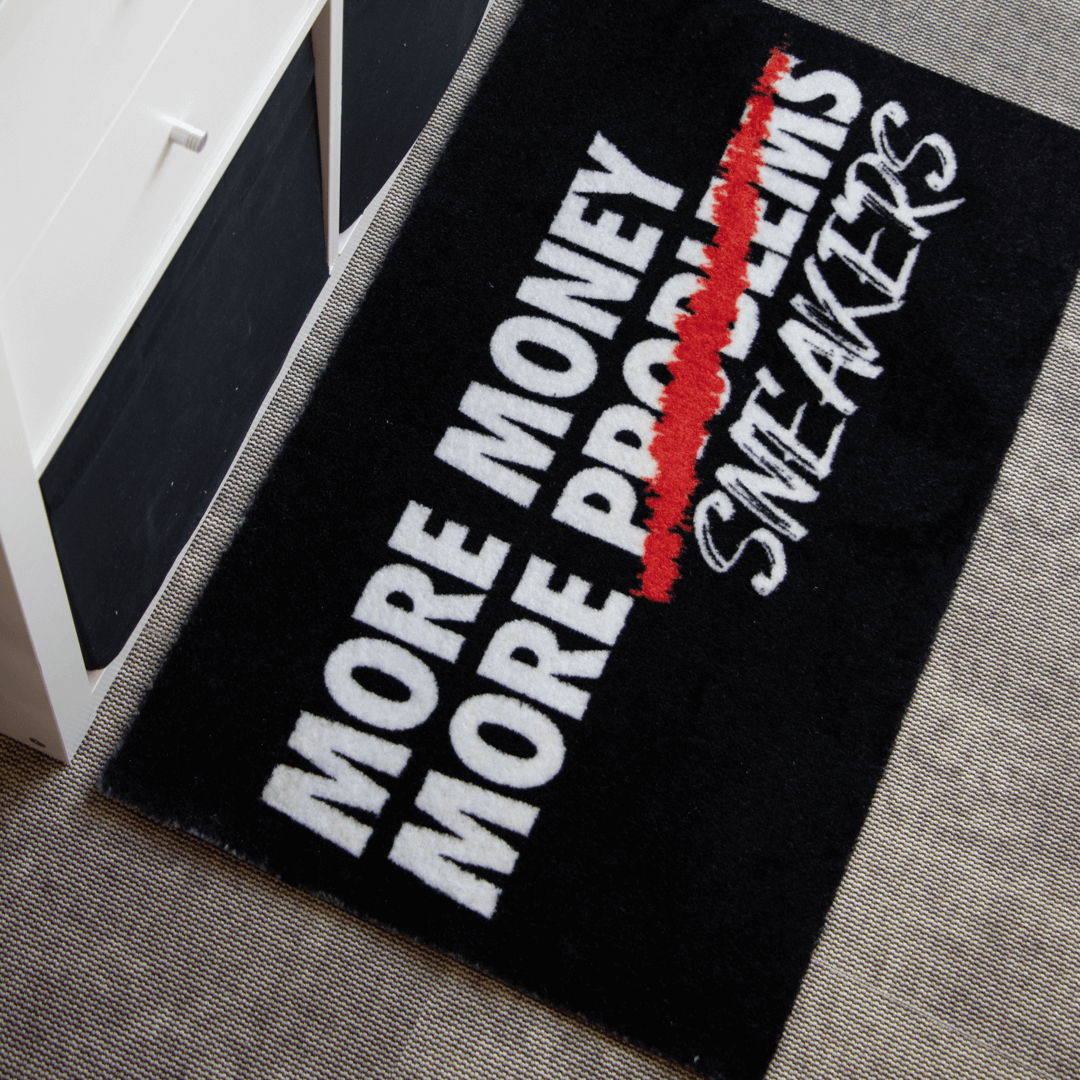 a black and white rug with white text on it