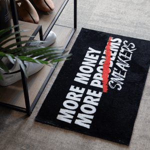 a black and white rug with white text on it